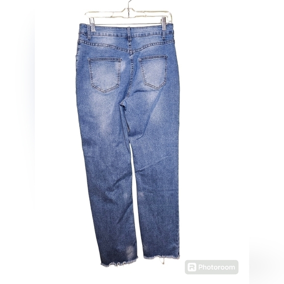 Off center tab light wash stretch jeans with rough bottom hem. Size medium - Picture 2 of 3